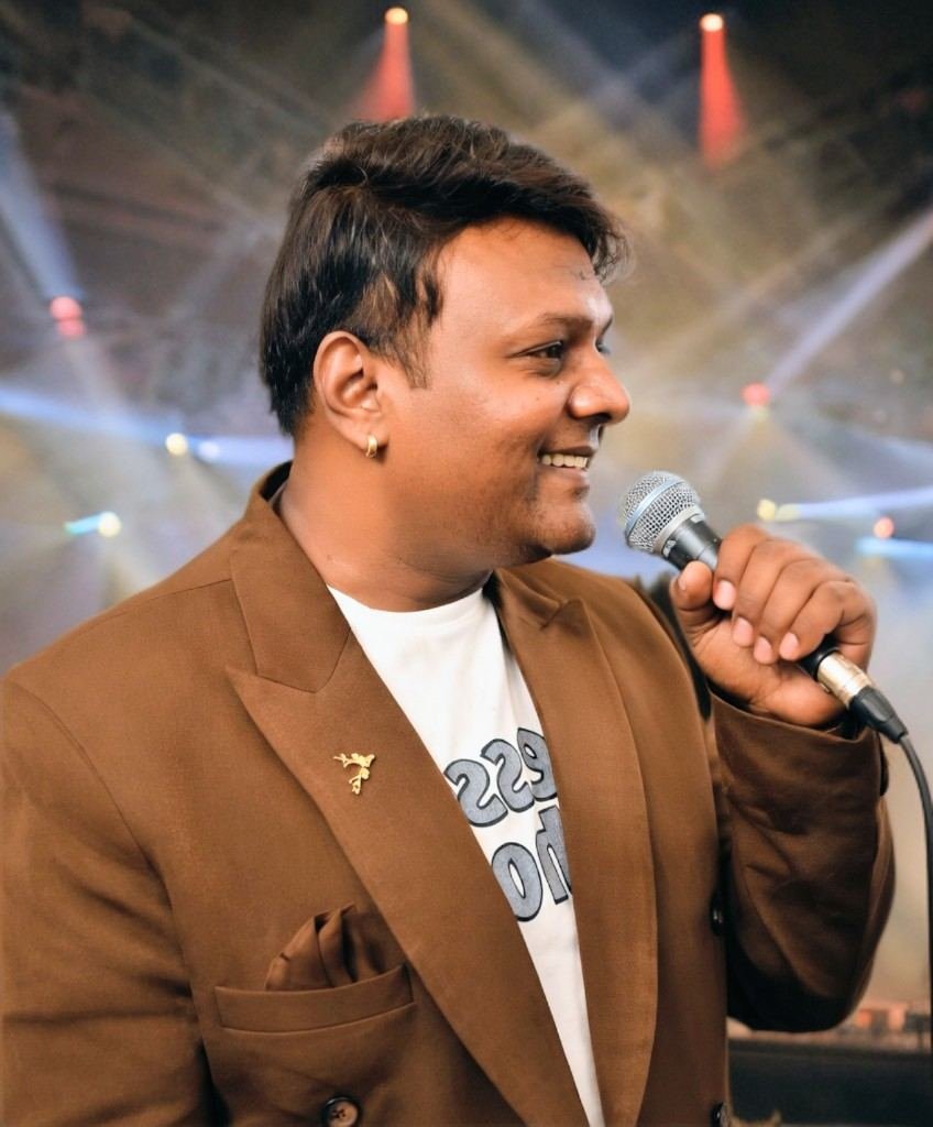 Radhe singing on stage